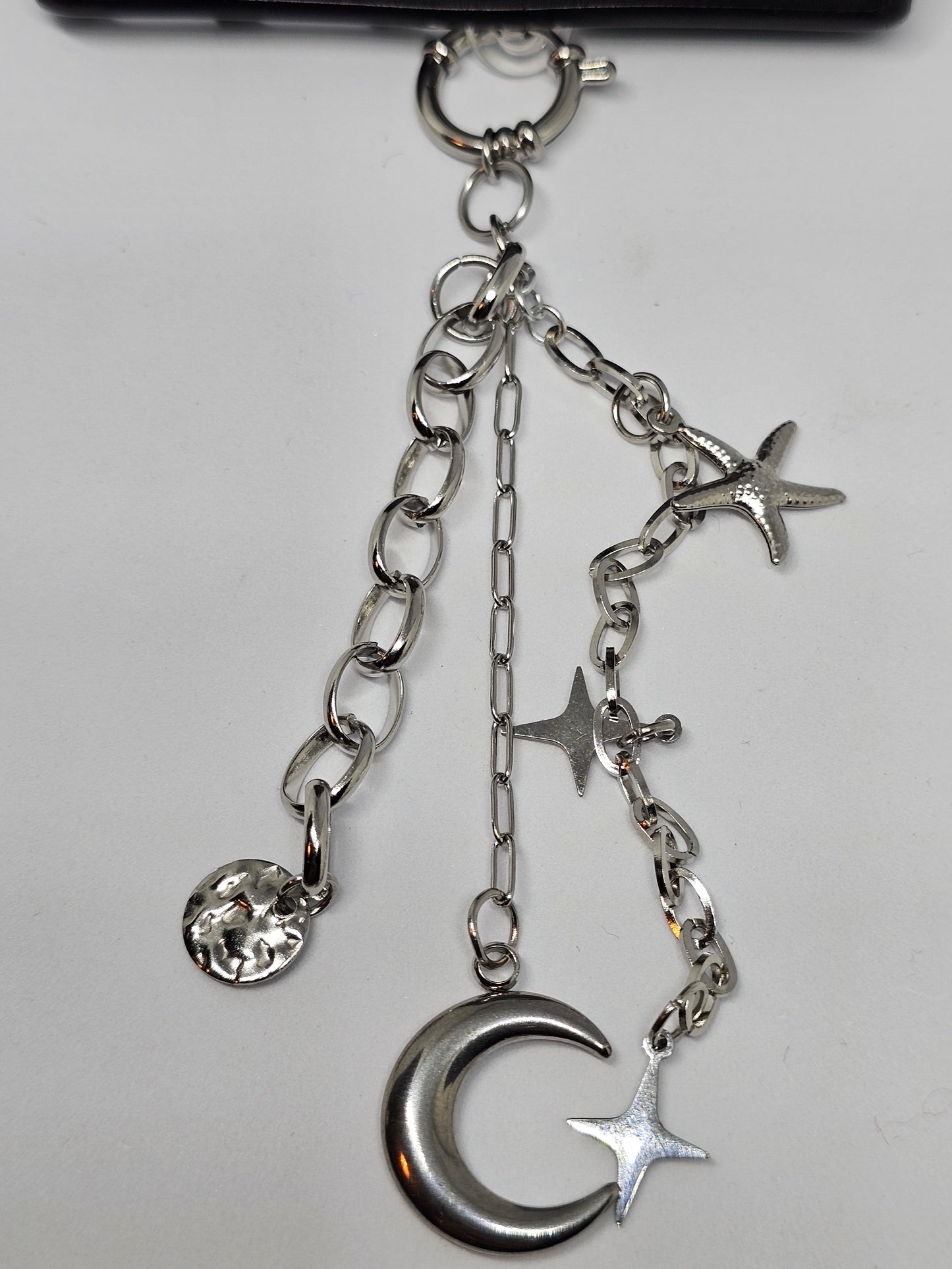 Les charms de téléphone Luna argenté