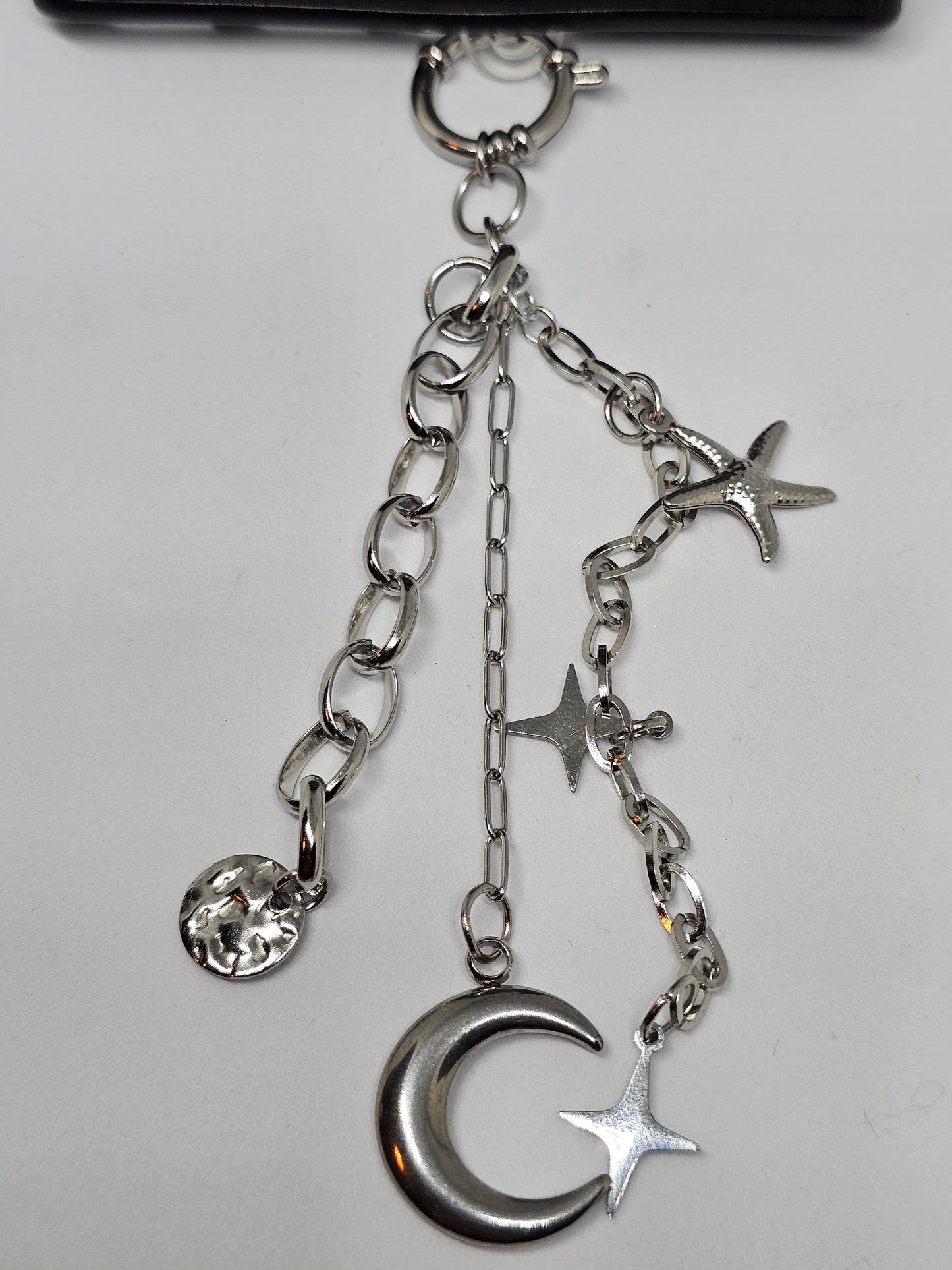 Les charms de téléphone Luna argenté